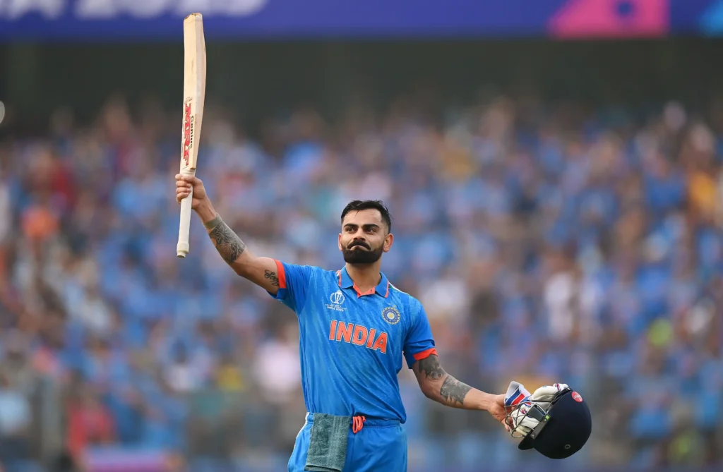 Virat_Kohli_of_India_celebrates_after_scoring_a_century_44ef8b3acf